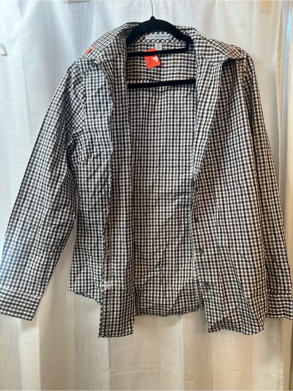 Port Authority Flannel, great capsule-wardrobe piece! Love the orange buttons!